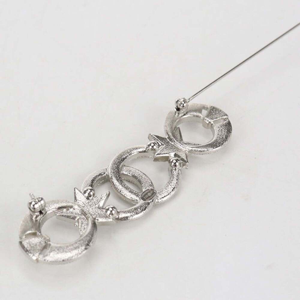 CHANEL Silver Logo Brooch - Picture 2 of 4